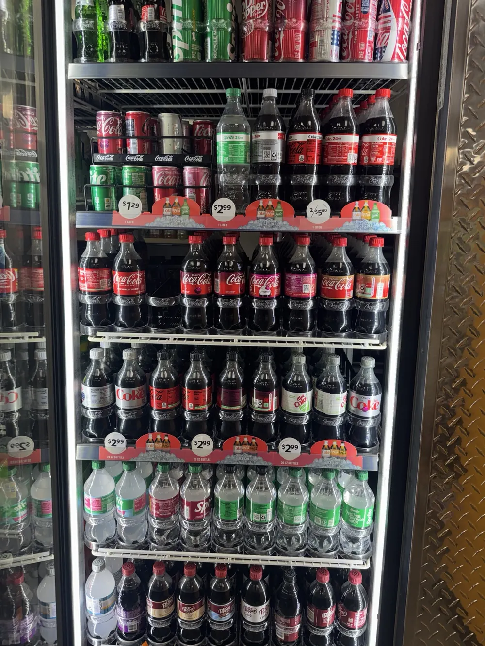 Coca-Cola, Diet Coke, Sprite and Dr Pepper drinks in Jack's cooler